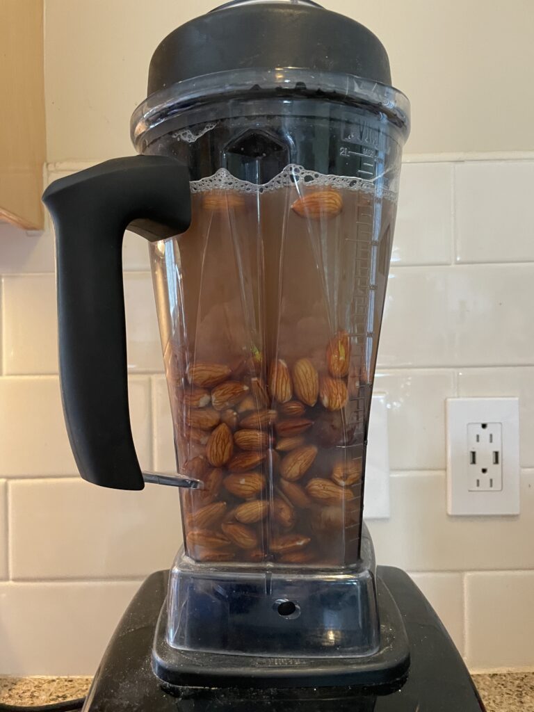 Vitamixer with almond water mixture